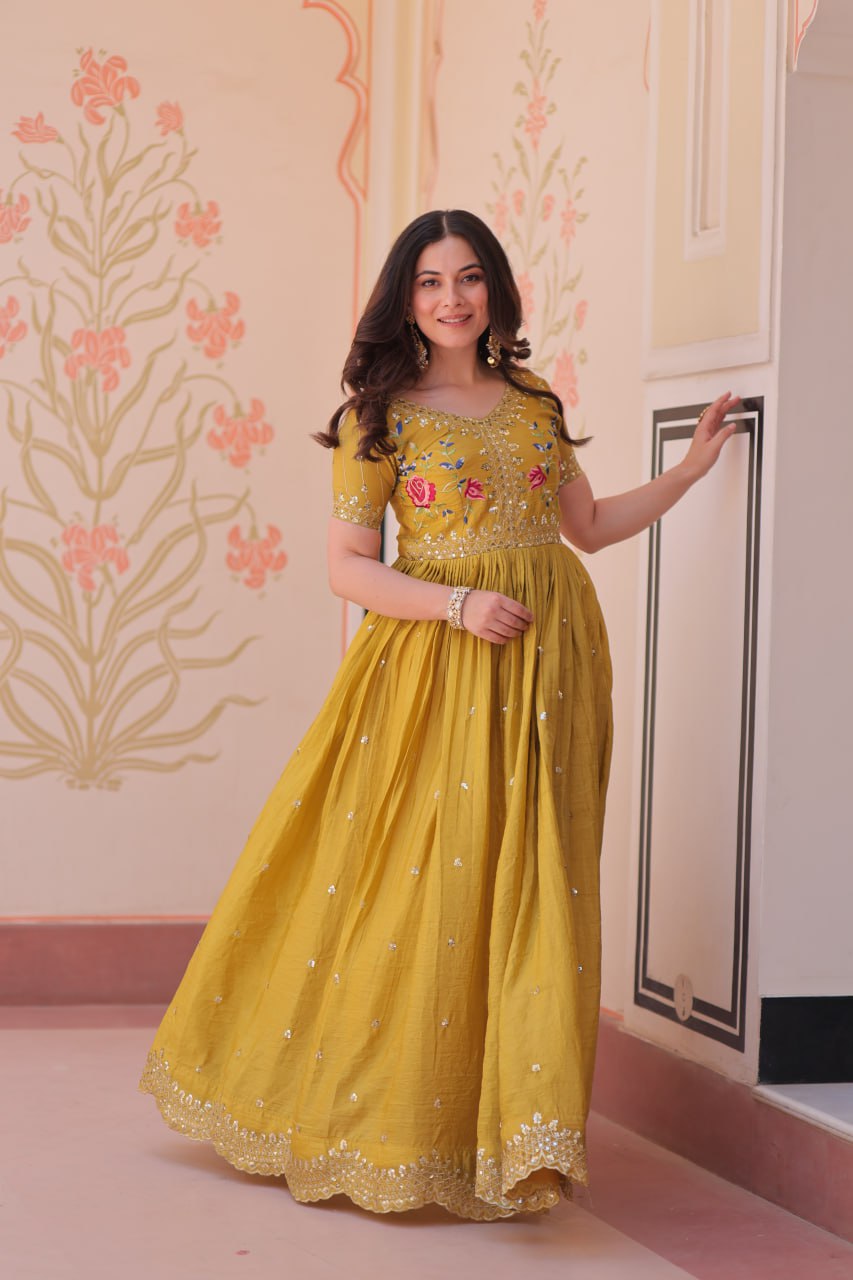 Mustard Yellow Gold Crush gown with zari, sequins, and multi-thread embroidery, featuring V-neck and short sleeves – perfect for weddings and festive occasions